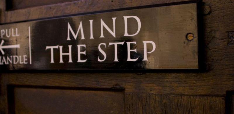 Mind the step wooden sign